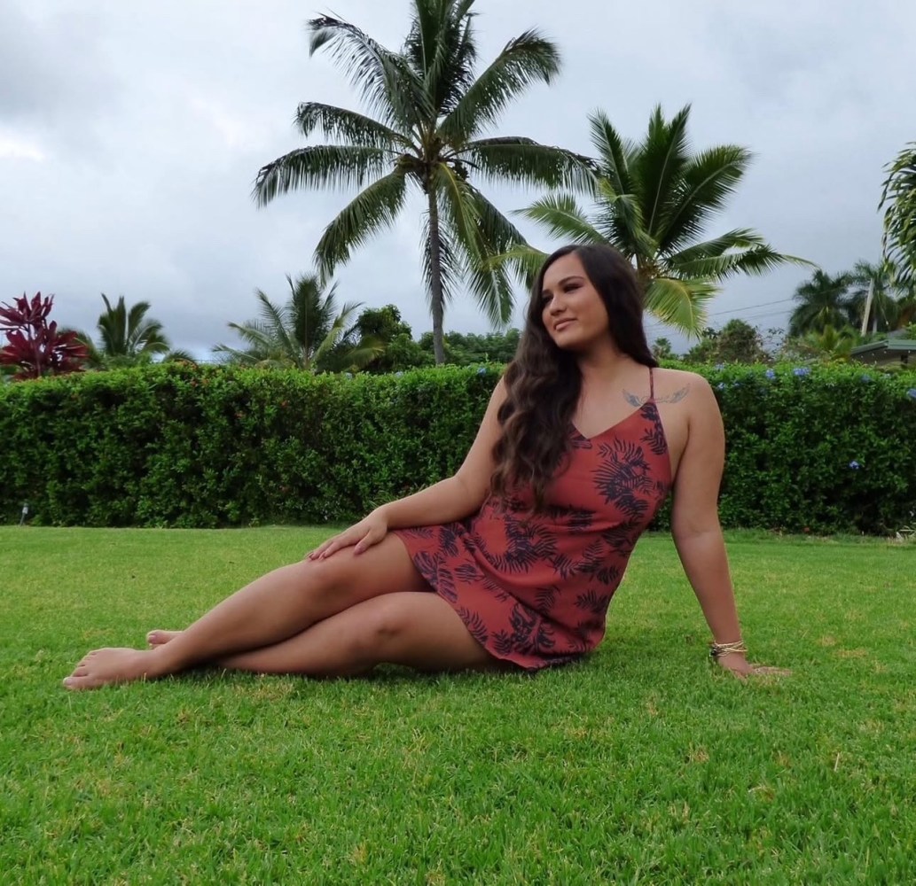 a person sitting on the grass