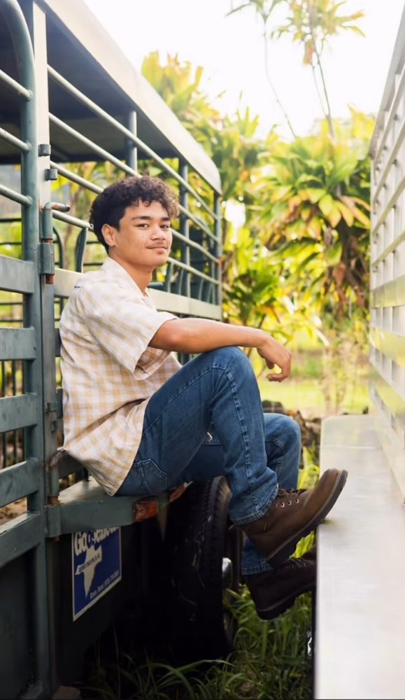a man sitting on a bench