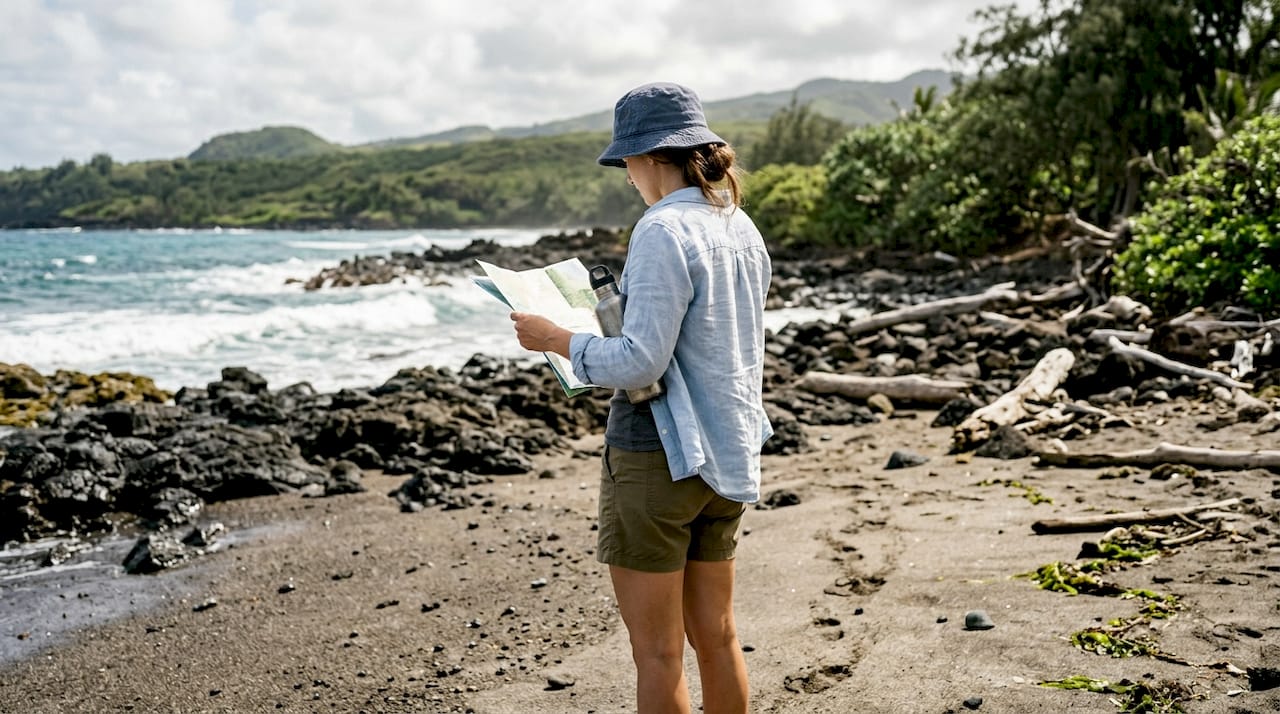 Traveler at Hawaiian beach with eco gear