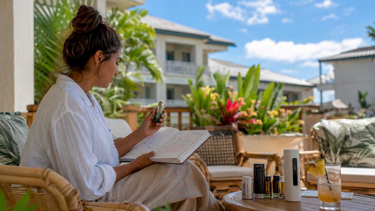 Marketing specialist checking scent diffuser in hotel lobby