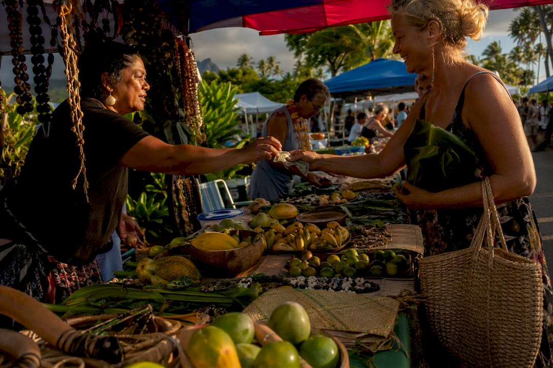 Local market with artisans selling crafts and food