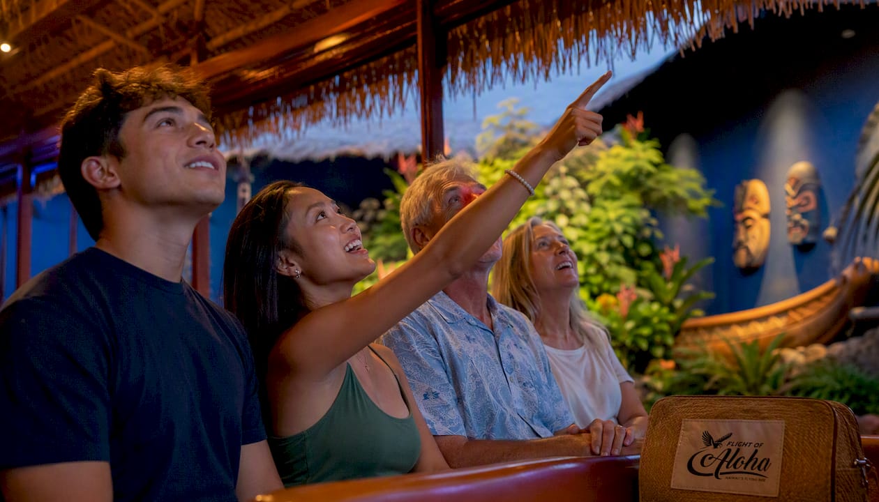 Tourists inside Flight of Aloha immersive traveling theater