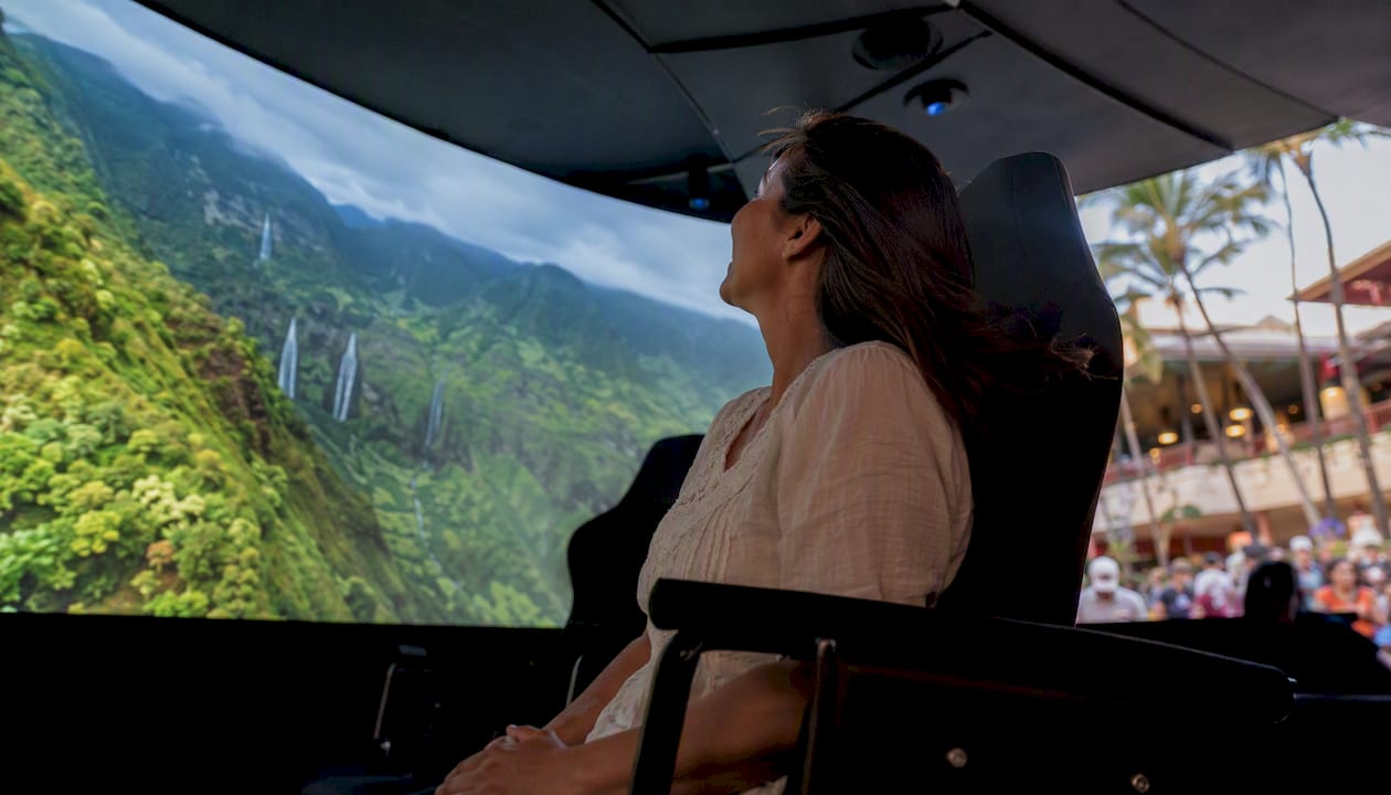 Visitor in Flight of Aloha flying theater seat