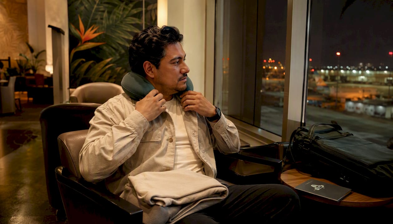 Passenger preparing seat for red-eye flight