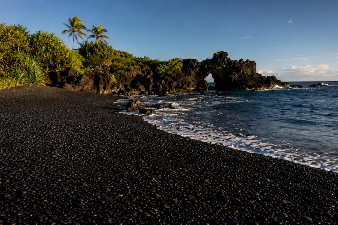 Black sand beach and sea arch at Waiʻānapanapa