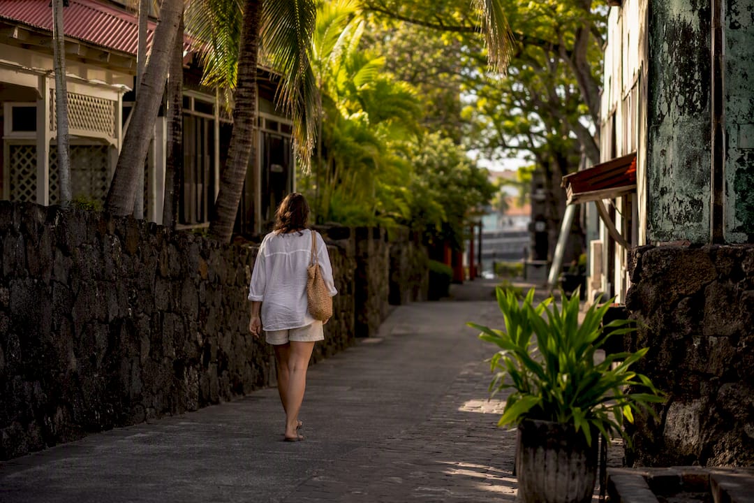 Traveler walking through historic Kailua Village