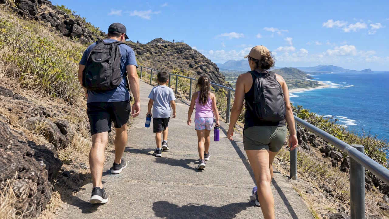 Family walking Makapuu coastal trail