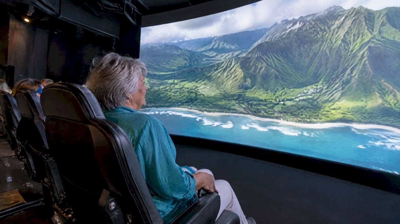 Visitor experiencing a simulated Hawaiian flight